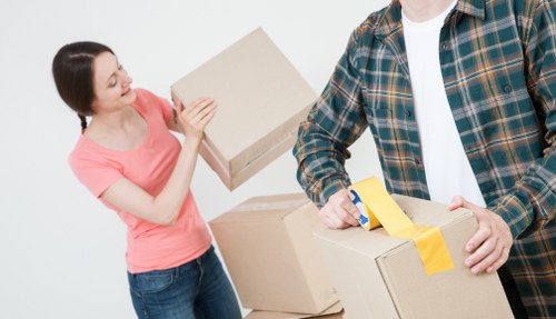 Loading furniture into a van for transport in a German city